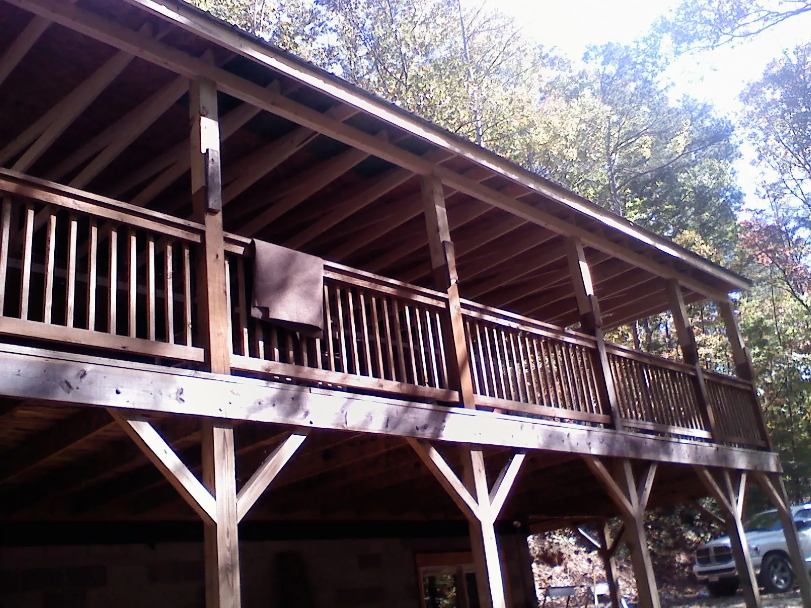 Timber framing under a new elevated porch and deck — Roof Leak Repair in Dennis Port by Roofing Brothers